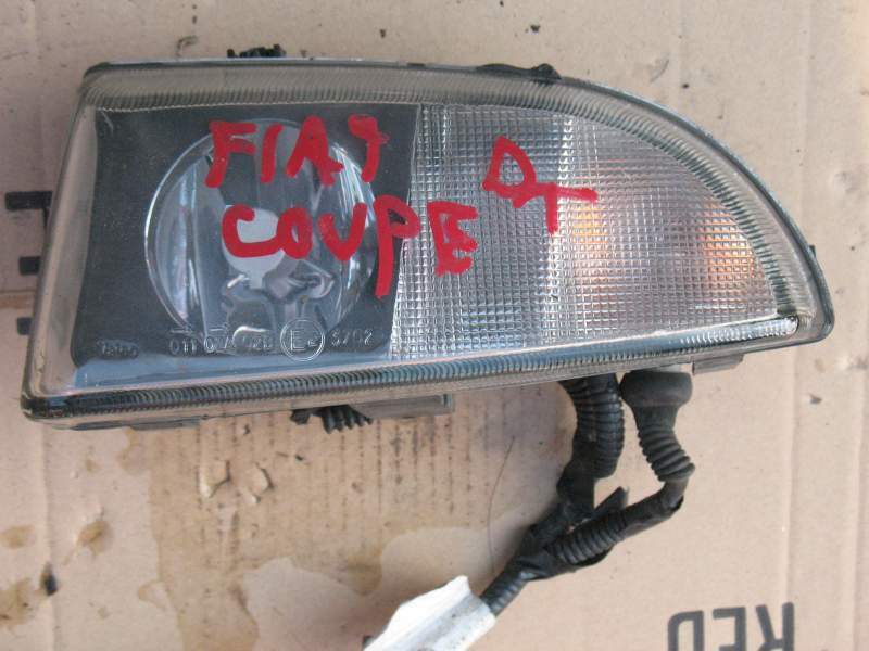 Gruppi ottici fanali anteriori dx/sx fiat coupe'